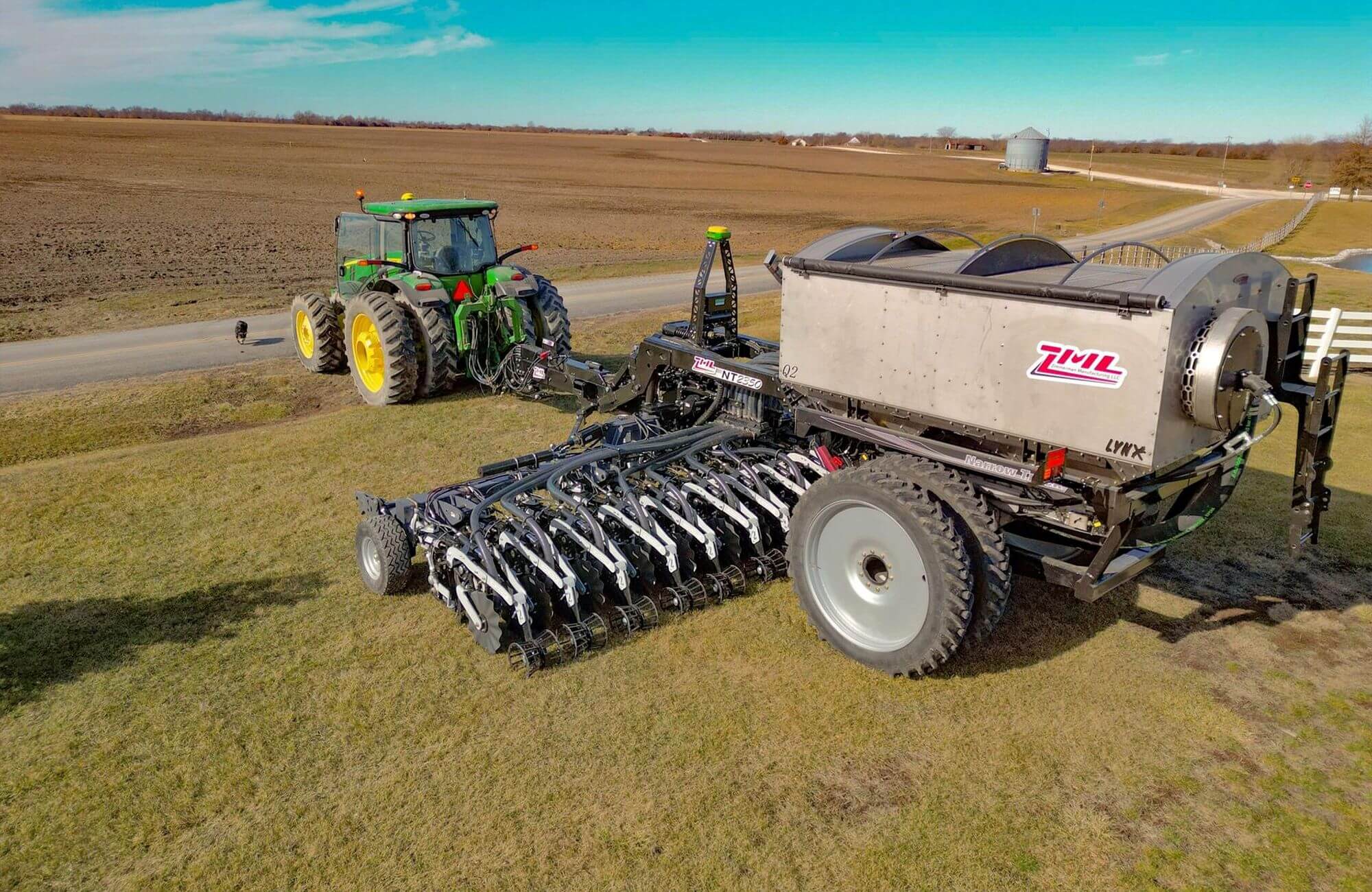 John Deere Tractor pulling ZML Lynx NT235Q Fertilizer Applicator